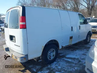 2007 Chevrolet Express Cargo Van with VIN 1GCGG25VX71126543, listed as a IAAI auction lot 41642079 with 97,859 mi miles. Bid and sale history available at carsss.com. Image 4.