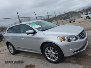 2015 Volvo XC60 T5 Drive-E Premier z VIN YV440MDB9F2613538, wystawiony jako IAAI lot #42183886 z przebiegiem 115 768 mil mil oraz . Historia ofert i sprzedaży dostępna na DreamBid. Obrazek 13.