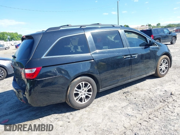 2011 Honda Odyssey EX-L with VIN 5FNRL5H67BB087064, listed as a IAAI auction lot 42326427 with 177,795 mi miles and . Bid and sale history available at DreamBid. Image 4.