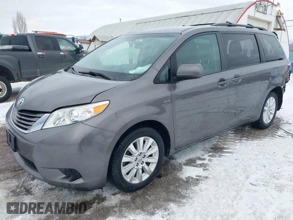 2016 Toyota Sienna LE with VIN 5TDJK3DC6GS142669, listed as a IAAI auction lot 41436771 with 135,715 mi miles. Bid and sale history available at carsss.com. Image 2.