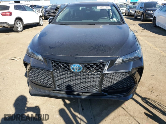 2021 Toyota Avalon Hybrid XSE z VIN 4T1EA1AB6MU007490, wystawiony jako Copart lot #75132224 z przebiegiem 61 669 mil mil oraz Nie do naprawy • Non repairable. Historia ofert i sprzedaży dostępna na DreamBid. Obrazek 5.