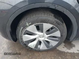 2024 Tesla Model Y Long Range z VIN 7SAYGDEE5RA260614, wystawiony jako IAAI lot #42191551 z przebiegiem 16 375 mil mil oraz . Historia ofert i sprzedaży dostępna na DreamBid. Obrazek 20.