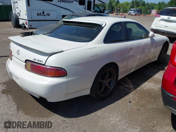 1997 Lexus SC 300 with VIN JT8CD32Z2V0039032, listed as a IAAI auction lot 42556454 with 164,629 mi miles and . Bid and sale history available at DreamBid. Image 4.