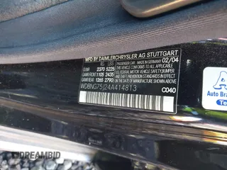 2004 Mercedes-Benz S-Class 5.0L with VIN WDBNG75J24A414813, listed as a IAAI auction lot 41911565 with 999,999 mi miles. Bid and sale history available at carsss.com. Image 9.