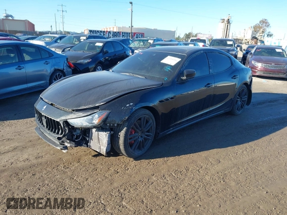 2021 Maserati Ghibli S with VIN ZAM57YSA3M1365483, listed as a IAAI auction lot 41488486 with 51,954 mi miles and . Bid and sale history available at DreamBid. Image 2.