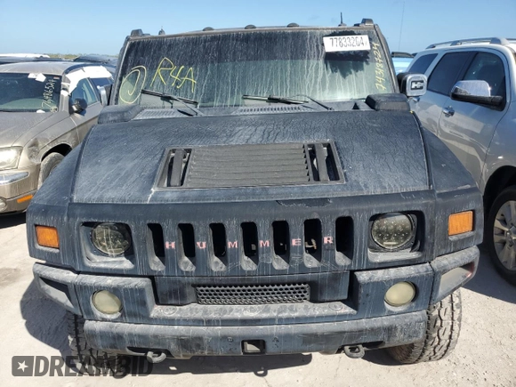 2003 Hummer H2 with VIN 5GRGN23U13H143781, listed as a Copart auction lot 77833264 with 0 mi miles and Salvage Title. Bid and sale history available at carsss.com. Image 5.