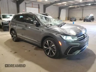 2023 Volkswagen Tiguan SEL R-Line with VIN 3VV4B7AX3PM072402, listed as a Copart auction lot 56656515 with 13,686 mi miles and Salvage title. Bid and sale history available at DreamBid. Image 4.