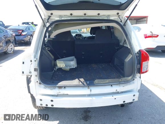 2011 Jeep Compass Latitude with VIN 1J4NT1FB2BD236439, listed as a IAAI auction lot 41935842 with 164,893 mi miles. Bid and sale history available at carsss.com. Image 18.