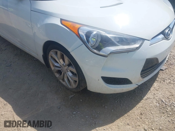 2013 Hyundai Veloster w/Black Int with VIN KMHTC6AD2DU131983, listed as a IAAI auction lot 42671646 with 131,731 mi miles and . Bid and sale history available at DreamBid. Image 6.