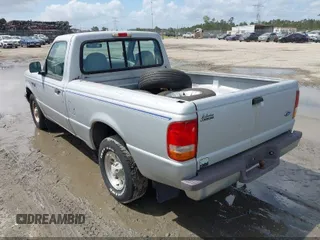 1997 Ford Ranger XLT with VIN 1FTCR10A9VUC47955, listed as a IAAI auction lot 42144050 with 213,615 mi miles and . Bid and sale history available at DreamBid. Image 3.