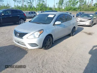 2015 Nissan Versa SV with VIN 3N1CN7AP6FL863791, listed as a IAAI auction lot 42140790 with 141,759 mi miles. Bid and sale history available at carsss.com. Image 2.