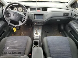 2003 Mitsubishi Lancer OZ-Rally with VIN JA3AJ86E33U079131, listed as a Copart auction lot 88582825 with 213,593 mi miles and Salvage Title. Bid and sale history available at carsss.com. Image 8.