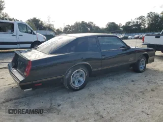 1987 Chevrolet Monte Carlo z VIN 1G1GZ11G0HP115148, wystawiony jako Copart lot #75645874 z przebiegiem 86 744 mil mil oraz Nie do naprawy. Historia ofert i sprzedaży dostępna na DreamBid. Obrazek 3.