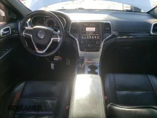 2016 Jeep Grand Cherokee High Altitude with VIN 1C4RJFCG5GC370627, listed as a Copart auction lot 89184435 with 112,989 mi miles and Salvage Title. Bid and sale history available at carsss.com. Image 8.