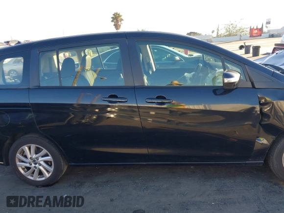 2014 Mazda 5 Sport with VIN JM1CW2BL1E0163682, listed as a IAAI auction lot 41344215 with 63,811 mi miles and . Bid and sale history available at carsss.com. Image 13.