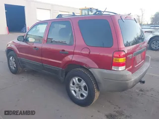 2003 Ford Escape XLT Popular 2 with VIN 1FMYU93143KC54170, listed as a IAAI auction lot 41763124 with 271,432 mi miles. Bid and sale history available at carsss.com. Image 3.
