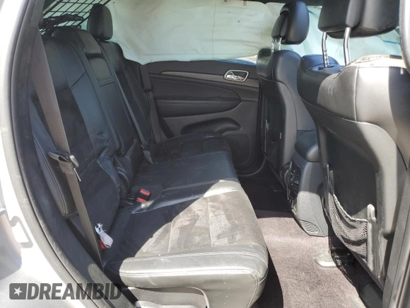 2017 Jeep Grand Cherokee Altitude z VIN 1C4RJFAG3HC738789, wystawiony jako Copart lot #54089375 z przebiegiem 82 150 mil mil oraz Szkody całkowita. Historia ofert i sprzedaży dostępna na DreamBid. Obrazek 11.