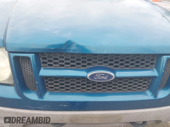 2001 Ford Explorer Sport Trac z VIN 1FMZU77E11UC71161, wystawiony jako IAAI lot #42184342 z przebiegiem 196 240 mil mil oraz . Historia ofert i sprzedaży dostępna na DreamBid. Obrazek 6.