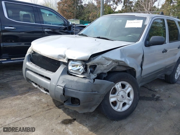 2004 Ford Escape XLT with VIN 1FMYU03184KB74819, listed as a IAAI auction lot 41838482 with 223,651 mi miles. Bid and sale history available at carsss.com. Image 6.