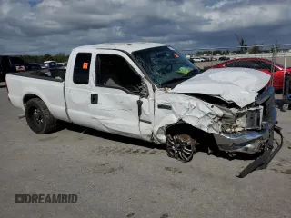 2004 Ford F-250 XL with VIN 1FTNX20PX4EA22882, listed as a Copart auction lot 79014334 with 262,447 mi miles and Salvage title. Bid and sale history available at DreamBid. Image 4.