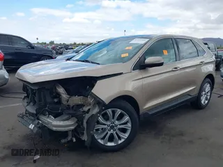 2020 Ford Edge Titanium z VIN 2FMPK3K98LBB41063, wystawiony jako IAAI lot #42204966 z przebiegiem 40 808 mil mil oraz . Historia ofert i sprzedaży dostępna na DreamBid. Obrazek 2.