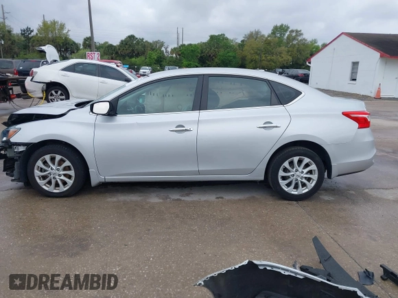 2019 Nissan Sentra S z VIN 3N1AB7AP7KY425276, wystawiony jako IAAI lot #41745256 z przebiegiem 72 306 mil mil oraz . Historia ofert i sprzedaży dostępna na DreamBid. Obrazek 15.