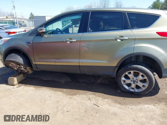 2013 Ford Escape SEL with VIN 1FMCU0HX1DUD51254, listed as a IAAI auction lot 41970516 with 83,616 mi miles. Bid and sale history available at carsss.com. Image 16.