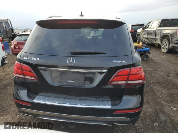 2016 Mercedes-Benz GLE 350 with VIN 4JGDA5HB0GA736602, listed as a Copart auction lot 42185875 with 124,002 mi miles and Salvage title. Bid and sale history available at DreamBid. Image 6.
