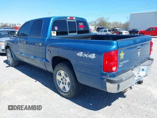 2005 Dodge Dakota SLT with VIN 1D7HW48N05S339156, listed as a IAAI auction lot 41862684 with 158,796 mi miles and . Bid and sale history available at DreamBid. Image 3.