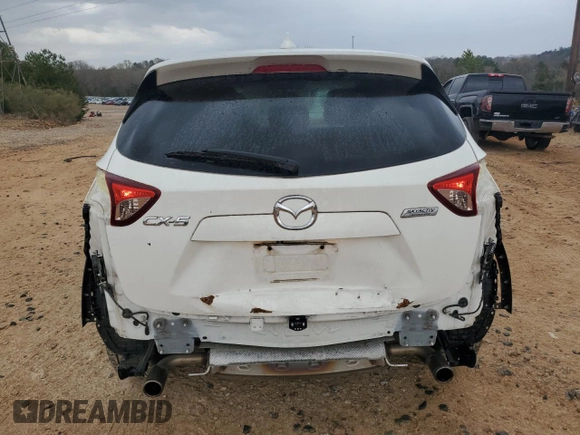 2014 Mazda CX-5 Touring with VIN JM3KE2CY1E0379158, listed as a Copart auction lot 50085935 with 90,340 mi miles and Salvage Title. Bid and sale history available at carsss.com. Image 6.