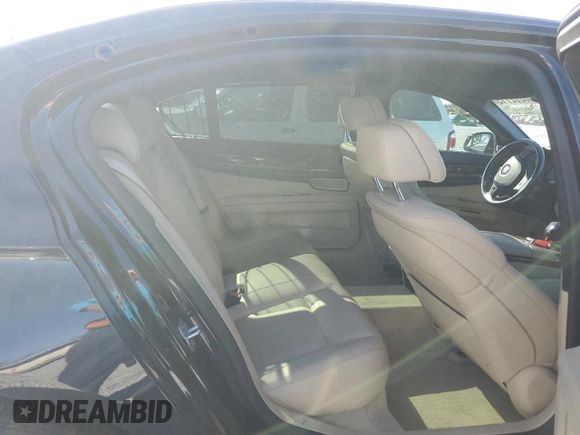 2015 BMW 7 Series 750Li with VIN WBAYE8C51FD781006, listed as a Copart auction lot 48202715 with 50,601 mi miles and Salvage Title. Bid and sale history available at carsss.com. Image 10.