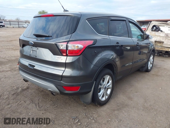 2017 Ford Escape SE z VIN 1FMCU0GD9HUD28110, wystawiony jako IAAI lot #41903505 z przebiegiem 66 808 mil mil oraz . Historia ofert i sprzedaży dostępna na DreamBid. Obrazek 4.