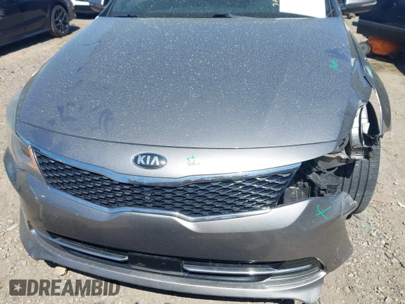 2018 Kia Optima SX with VIN 5XXGV4L26JG187281, listed as a IAAI auction lot 41887939 with 124,782 mi miles and . Bid and sale history available at DreamBid. Image 13.