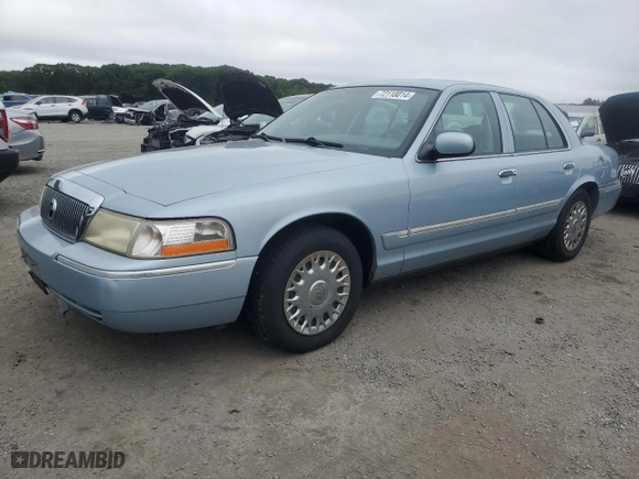 2003 Mercury Grand Marquis GS Convenience with VIN 2MEFM74W63X704603, listed as a Copart auction lot 72118014 with 128,599 mi miles and Clean Title. Bid and sale history available at carsss.com. Image 1.