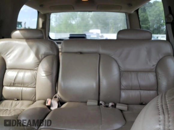 1998 Chevrolet Tahoe z VIN 1GNEK13R7WJ348565, wystawiony jako Copart lot #53375725 z przebiegiem 176 919 mil mil oraz Szkoda całkowita • Salvage title. Historia ofert i sprzedaży dostępna na DreamBid. Obrazek 10.