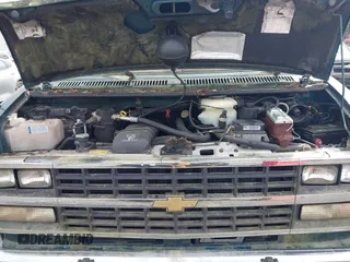 1995 Chevrolet Chevy Van z VIN 1GBEG25K0SF243254, wystawiony jako IAAI lot #41915622 z przebiegiem 74 262 mil mil oraz . Historia ofert i sprzedaży dostępna na DreamBid. Obrazek 10.