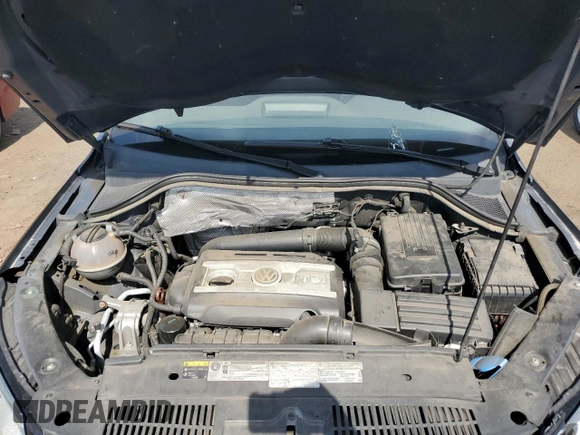 2013 Volkswagen Tiguan SE z VIN WVGBV3AX9DW603521, wystawiony jako Copart lot #59406465 z przebiegiem 133 647 mil mil oraz Szkoda całkowita • Salvage title. Historia ofert i sprzedaży dostępna na DreamBid. Obrazek 11.