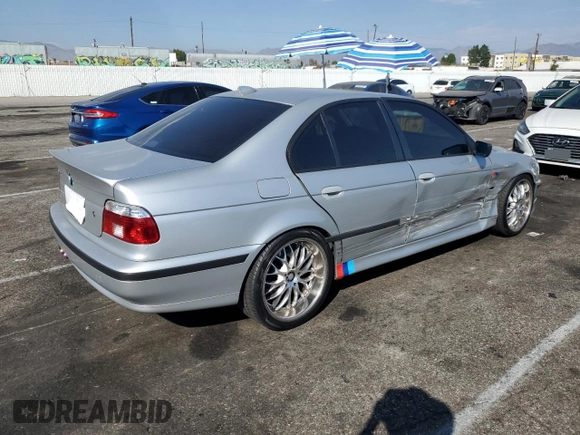 2000 BMW 5 Series 528iA with VIN WBADM6346YGU26119, listed as a Copart auction lot 73773084 with 177,616 mi miles and Salvage Title. Bid and sale history available at carsss.com. Image 3.