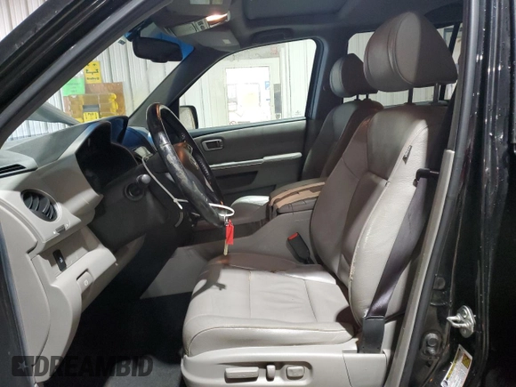 2012 Honda Pilot EX-L with VIN 5FNYF4H78CB017208, listed as a Copart auction lot 52321835 with 196,953 mi miles and Salvage Title. Bid and sale history available at DreamBid. Image 7.