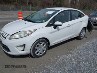 2012 Ford Fiesta S with VIN 3FADP4AJ5CM128060, listed as a IAAI auction lot 41855950 with 139,715 mi miles. Bid and sale history available at carsss.com. Image 2.