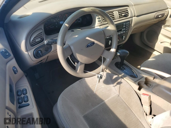 2004 Ford Taurus SE с VIN 1FAFP53214A167828, выставлен на аукционе Copart как лот 51046355 с пробегом Не указан миль и Списание • Salvage title. История ставок и продаж доступна на DreamBid. Изображение 8.