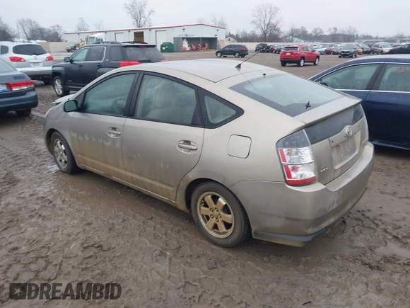 2004 Toyota Prius z VIN JTDKB20U940001168, wystawiony jako IAAI lot #41065063 z przebiegiem 299 999 mil mil oraz . Historia ofert i sprzedaży dostępna na DreamBid. Obrazek 3.