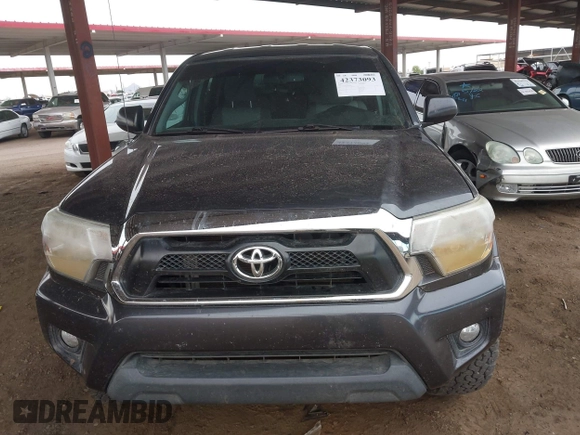 2013 Toyota Tacoma z VIN 3TMLU4EN9DM106995, wystawiony jako IAAI lot #42373093 z przebiegiem Nie podano mil oraz . Historia ofert i sprzedaży dostępna na DreamBid. Obrazek 12.