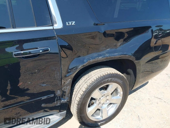 2015 Chevrolet Suburban LTZ with VIN 1GNSKKKC7FR205638, listed as a IAAI auction lot 40284367 with 103,530 mi miles and . Bid and sale history available at DreamBid. Image 6.