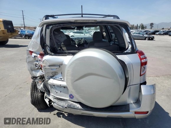2009 Toyota RAV4 with VIN JTMZF33V39D007979, listed as a Copart auction lot 52054865 with 179,446 mi miles and Salvage Title. Bid and sale history available at DreamBid. Image 6.