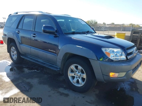 2003 Toyota 4Runner SR5 with VIN JTEZT14R238001097, listed as a IAAI auction lot 41266011 with 180,905 mi miles. Bid and sale history available at carsss.com. Image 1.