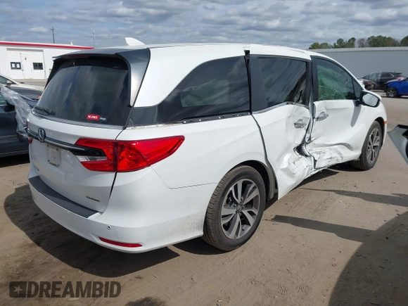 2022 Honda Odyssey Touring with VIN 5FNRL6H84NB062604, listed as a IAAI auction lot 41724006 with 41,351 mi miles and . Bid and sale history available at DreamBid. Image 4.