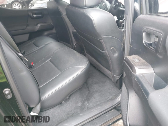 2018 Toyota Tacoma SR5 with VIN 3TMDZ5BN4JM047379, listed as a IAAI auction lot 39529466 with Not provided miles and . Bid and sale history available at DreamBid. Image 8.