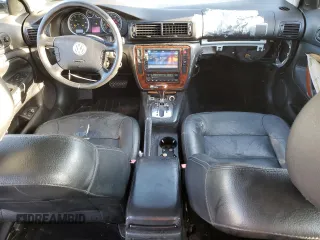 2004 Volkswagen Passat GLX with VIN WVWRH63BX4P143681, listed as a Copart auction lot 86345314 with 186,634 mi miles and Salvage title. Bid and sale history available at DreamBid. Image 8.