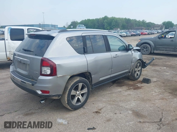 2016 Jeep Compass High Altitude with VIN 1C4NJDEBXGD730764, listed as a IAAI auction lot 42371491 with 125,302 mi miles and . Bid and sale history available at DreamBid. Image 4.